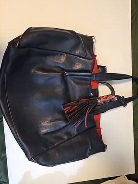 Women’s Black and Red Tote Bag with Decorative Tassel